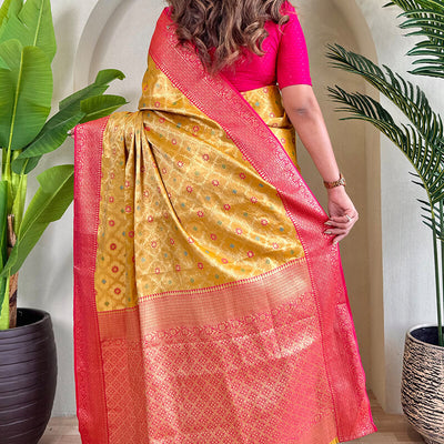 Staring Yellow Soft Banarasi Tissue Silk Saree With Ravishing Blouse Piece