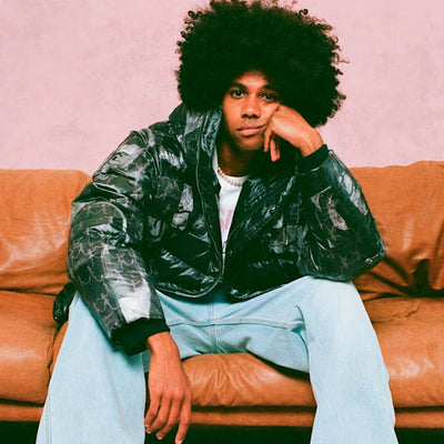 PUMA | X KIDSUPER ALL OVER PRINT PUFFER { BLACK