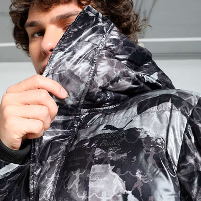 PUMA | X KIDSUPER ALL OVER PRINT PUFFER { BLACK