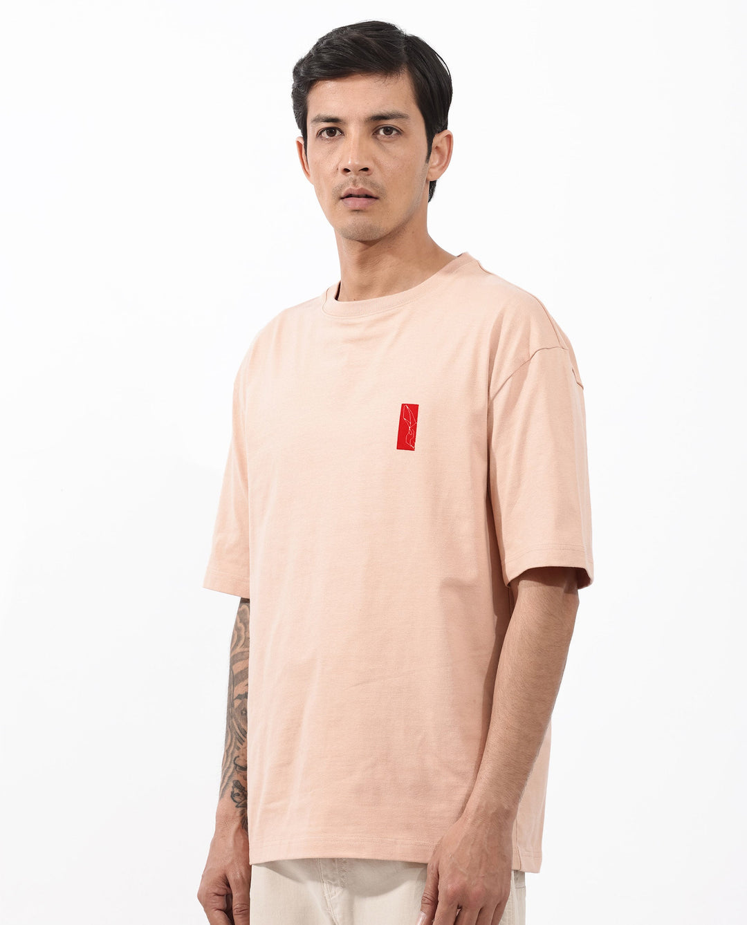 Rare Rabbit Articale Mens Vern Light Orange Cotton Polyester Fabric Short Sleeve Crew Neck Oversized Fit Printed T-Shirt