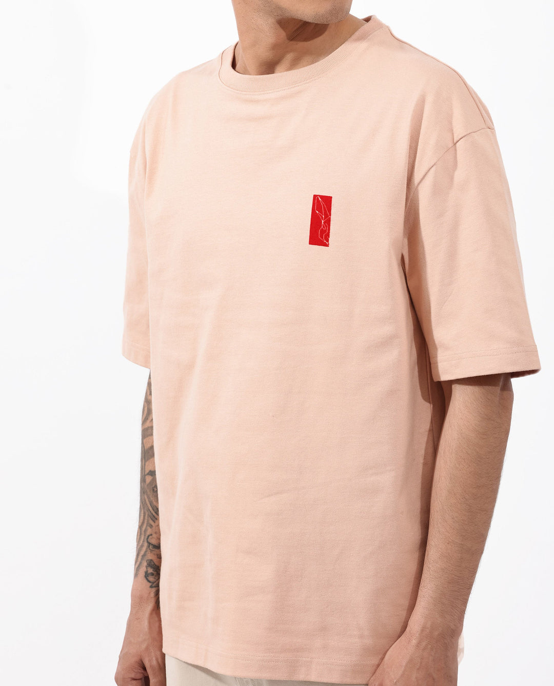 Rare Rabbit Articale Mens Vern Light Orange Cotton Polyester Fabric Short Sleeve Crew Neck Oversized Fit Printed T-Shirt