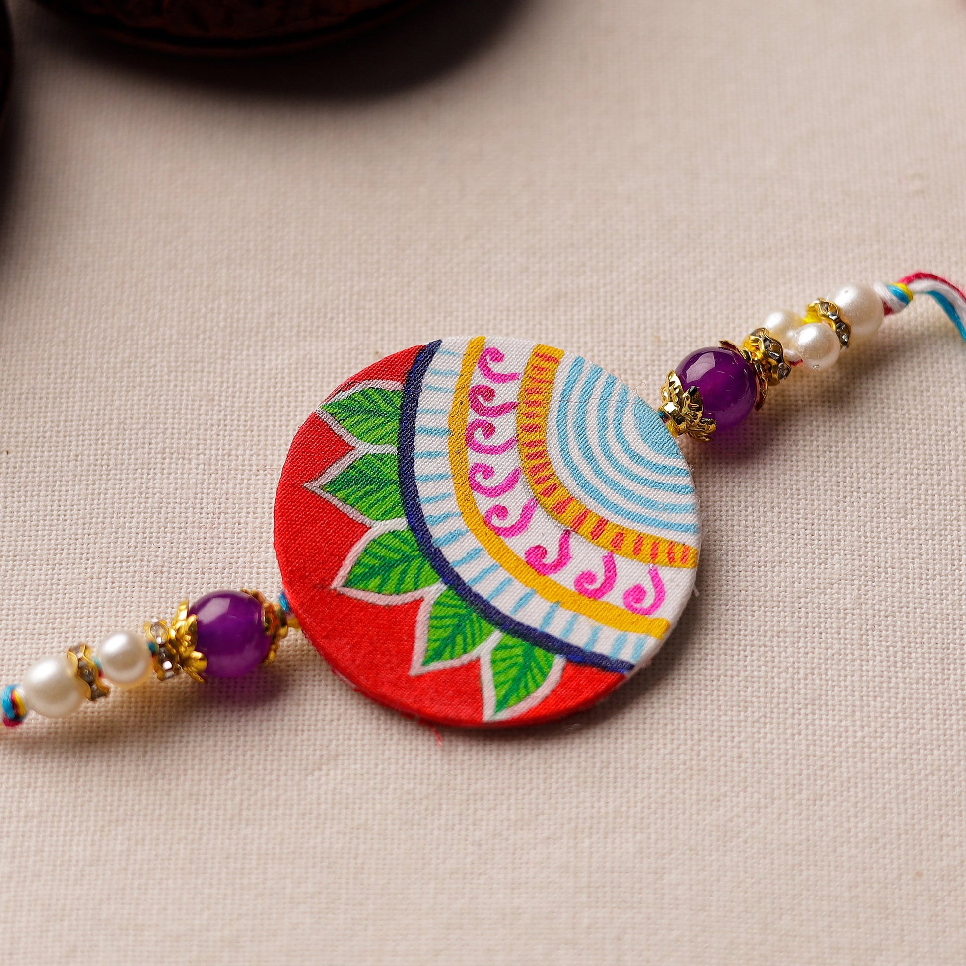 Bishnupur Handpainted Fabric Rakhi 17