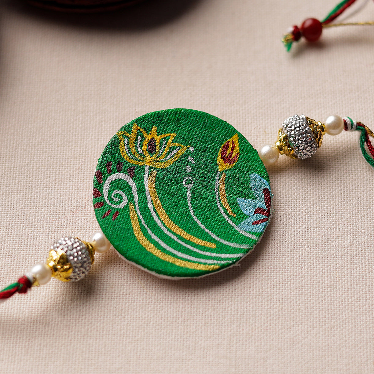 Bishnupur Handpainted Fabric Rakhi 11