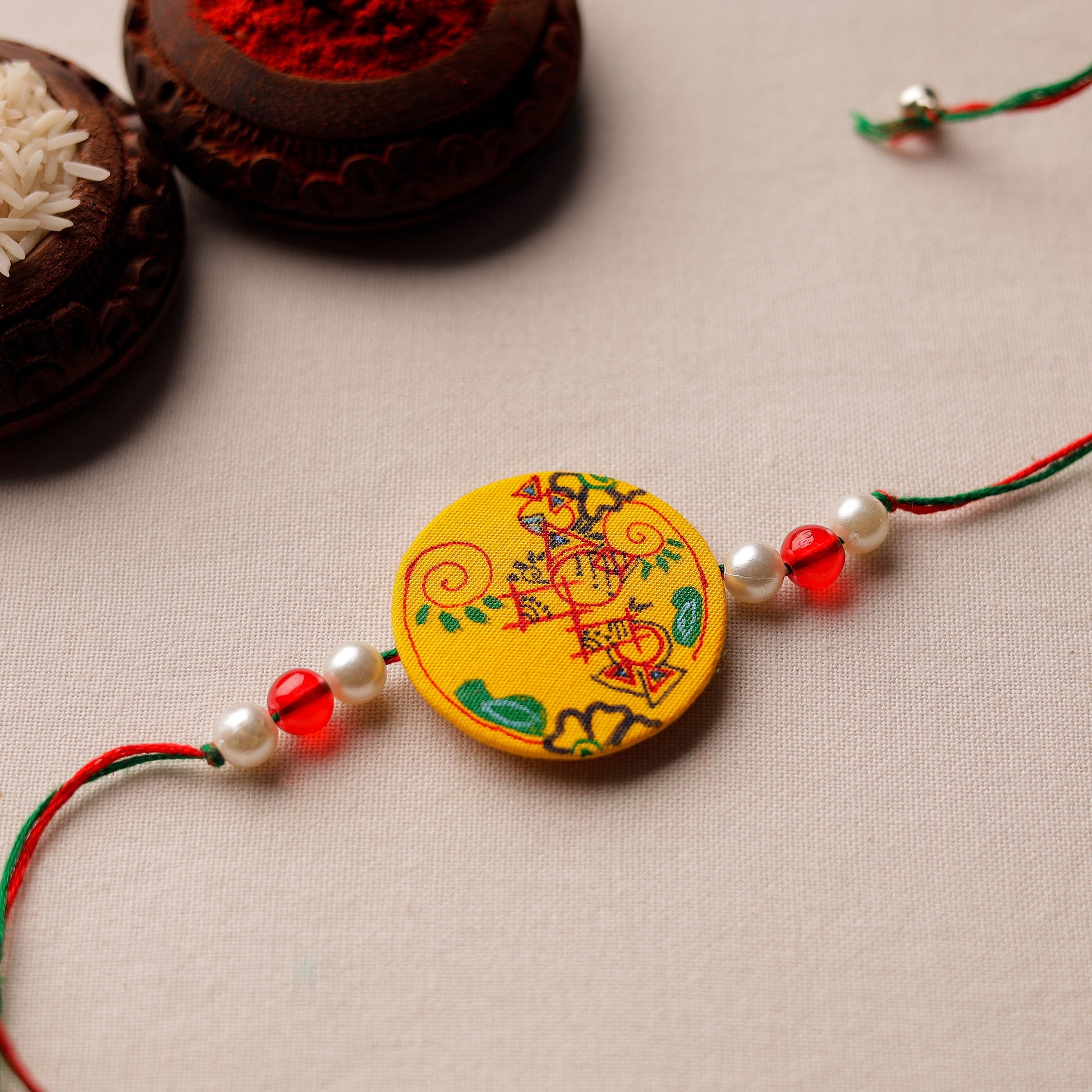 Bishnupur Handpainted Fabric Rakhi 06