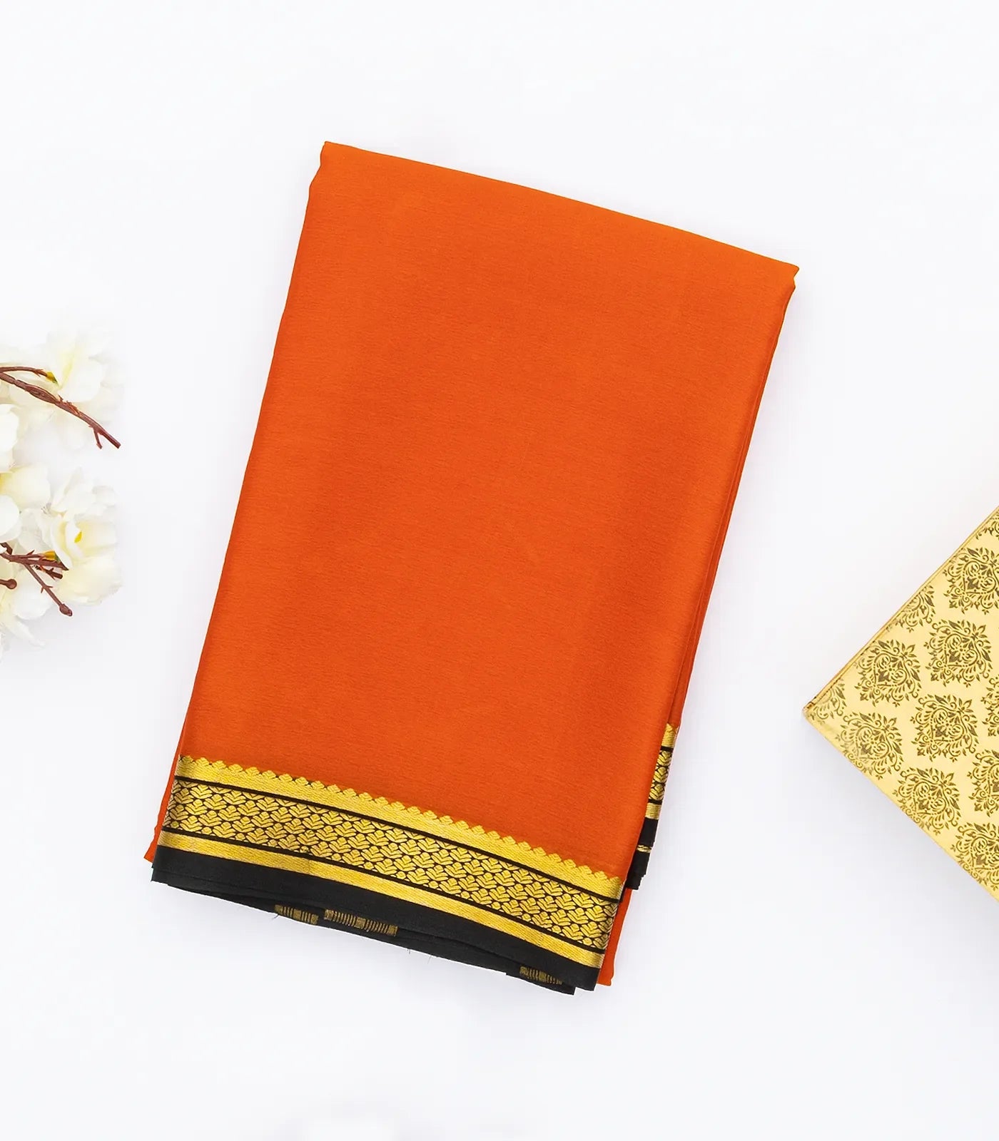 Orange Mysore Plain Crepe Silk Saree With Black Border