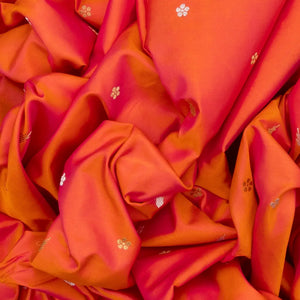 Orange Handwoven Banarasi Silk Saree With Floral Motif Buttas