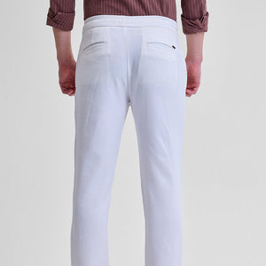 White Self-Design Slim Fit Trousers