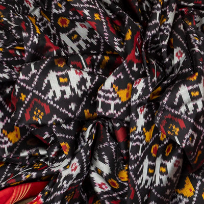 Black Handloom Ikat Silk Saree With Contrast Red Border