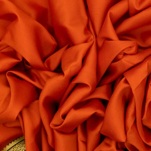 Orange Mysore Plain Crepe Silk Saree With Black Border