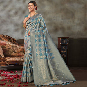 Blue Woven Organza Saree With Tassels