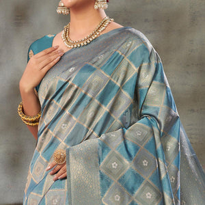Blue Woven Organza Saree With Tassels