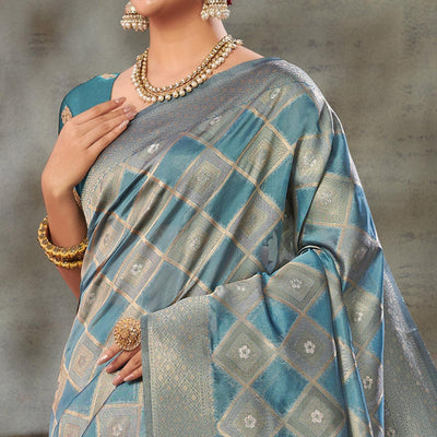 Blue Woven Organza Saree With Tassels