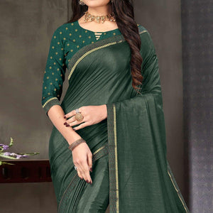 Bottle Green Festive Wear Embellished Art Silk Saree