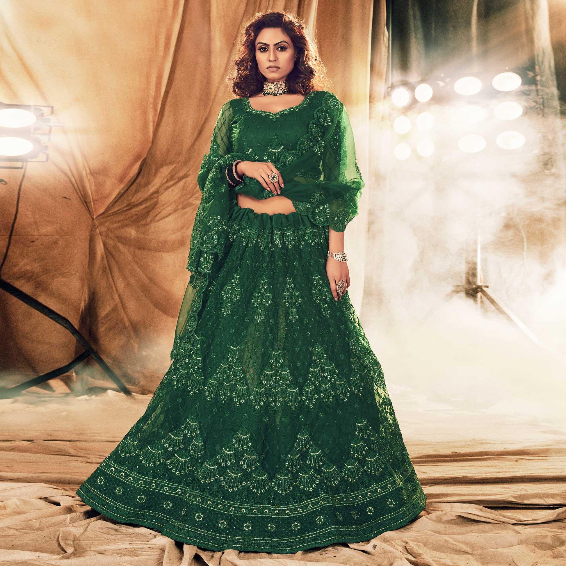 Breathtaking Green Colored Wedding Wear Embroidered Net Lehenga Choli