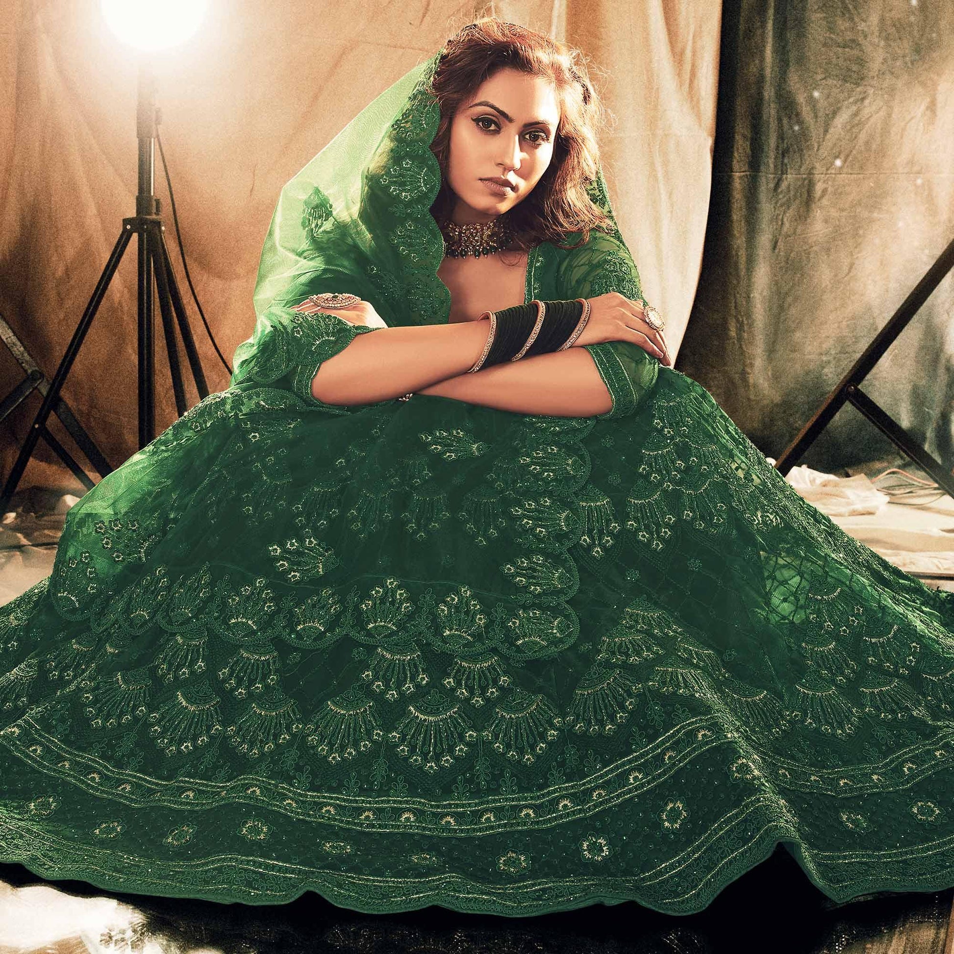 Breathtaking Green Colored Wedding Wear Embroidered Net Lehenga Choli