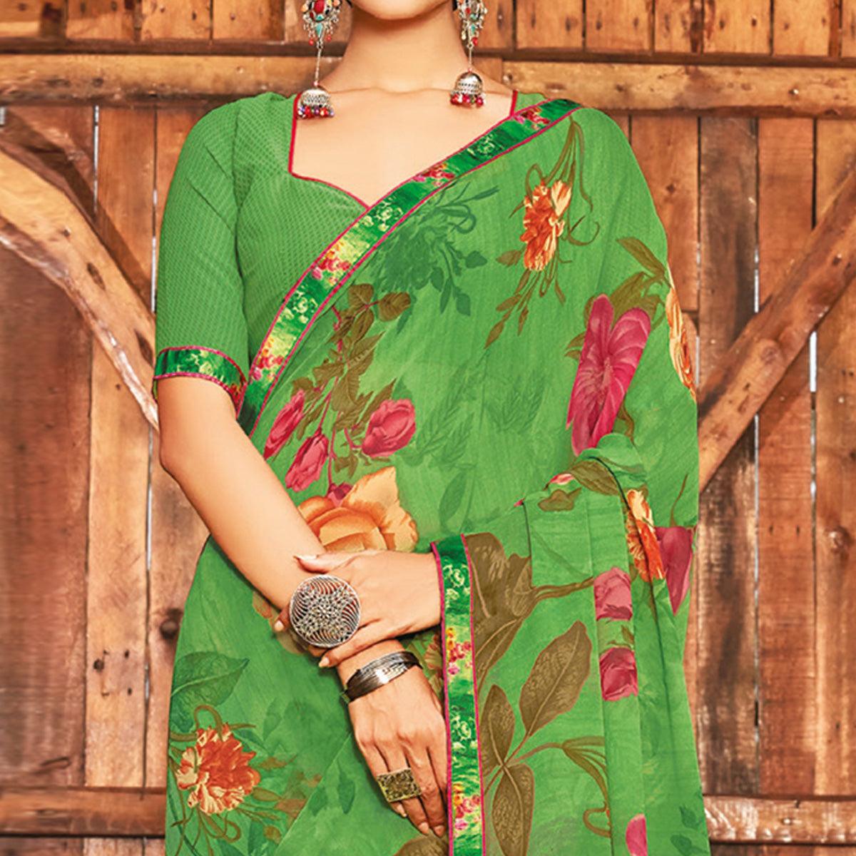 Breathtaking Green Coloured Partywear Pure Georgette Floral Printed Saree With Fancy Lace Border