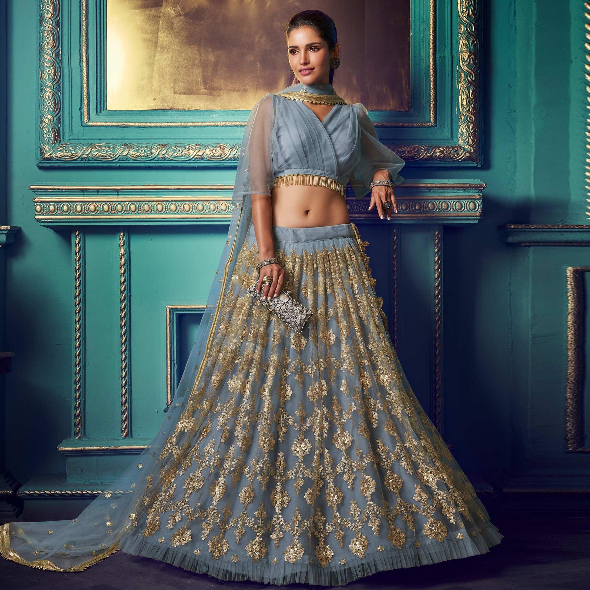 Breathtaking Grey Colored Partywear Embroidered Soft Net Lehenga Choli
