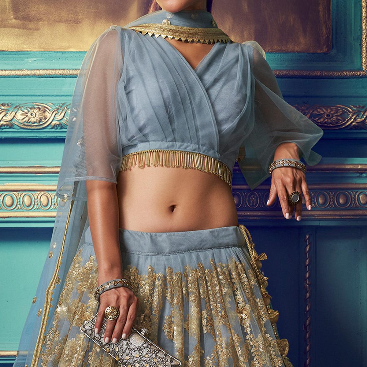Breathtaking Grey Colored Partywear Embroidered Soft Net Lehenga Choli
