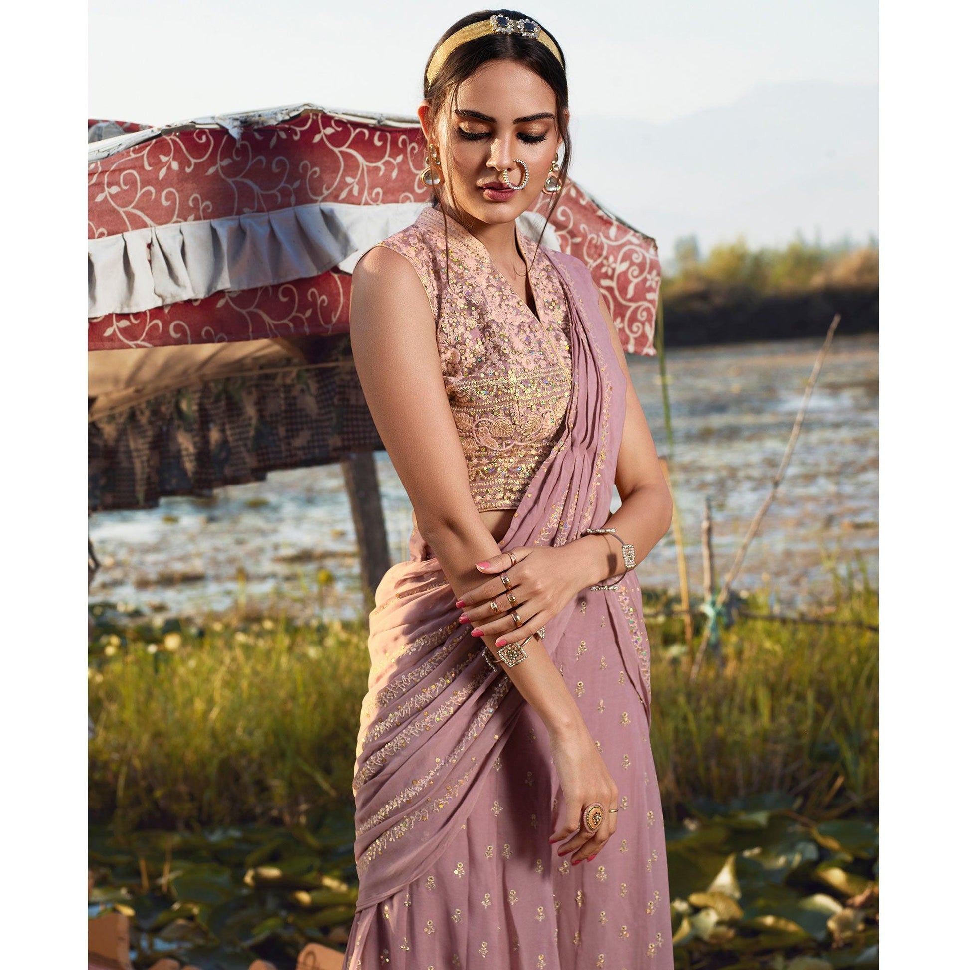 Breathtaking Lavender Colored Embroidered Partywear Heavy Georgette Suit