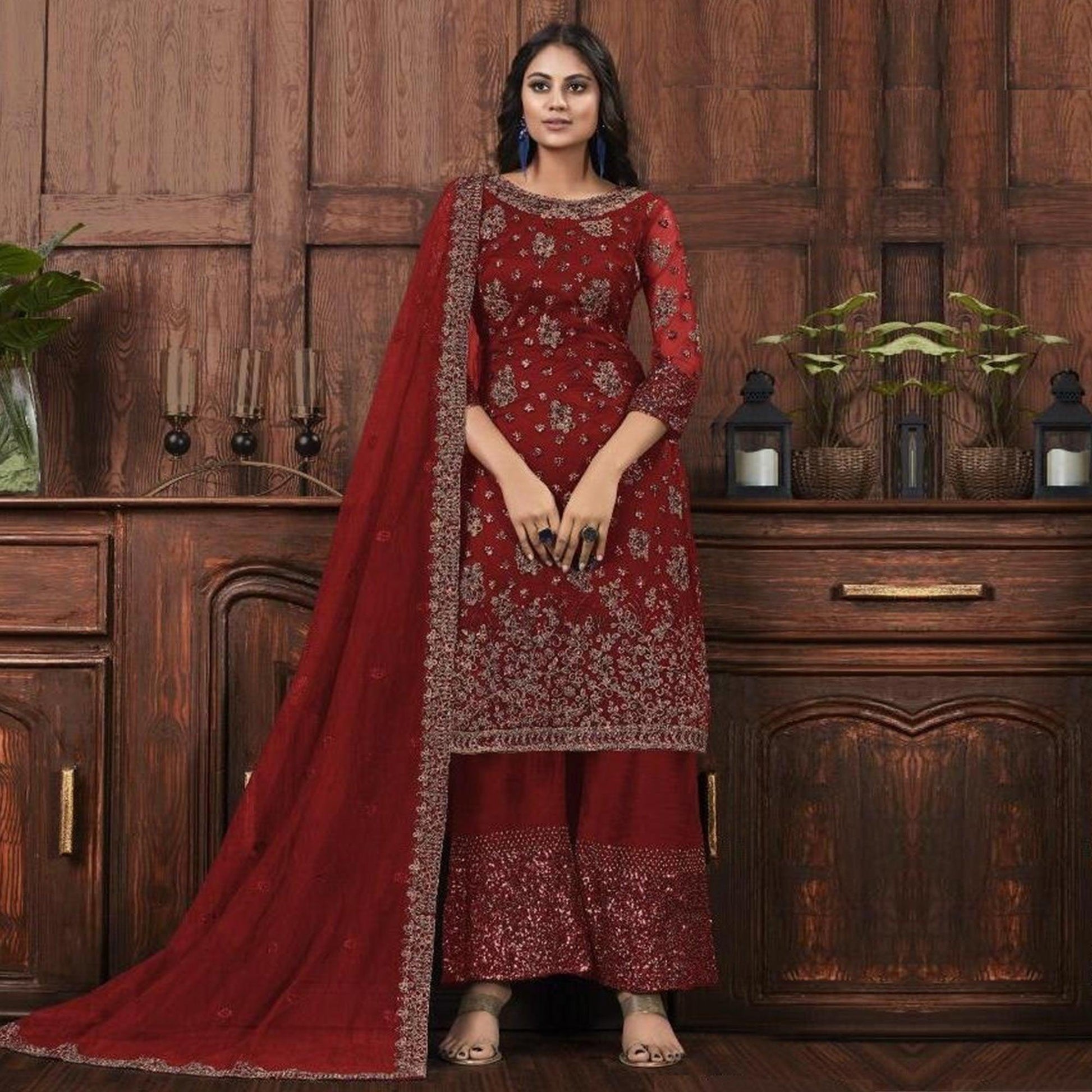 Breathtaking Maroon Colored Partywear Embroidered Net Palazzo Suit