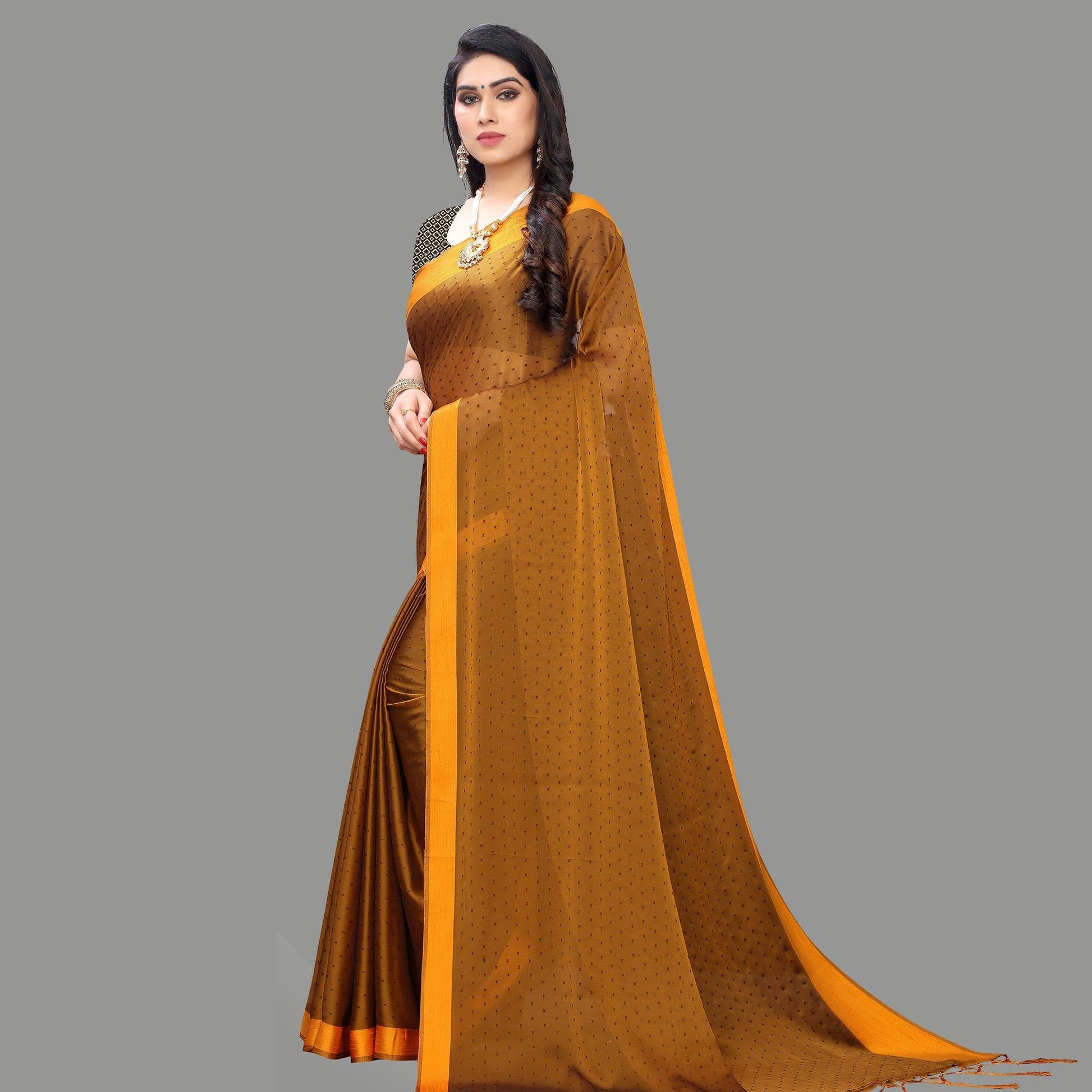 Breathtaking Mustard Yellow Colored Party Wear Printed Poly Georgette Saree With Tassels