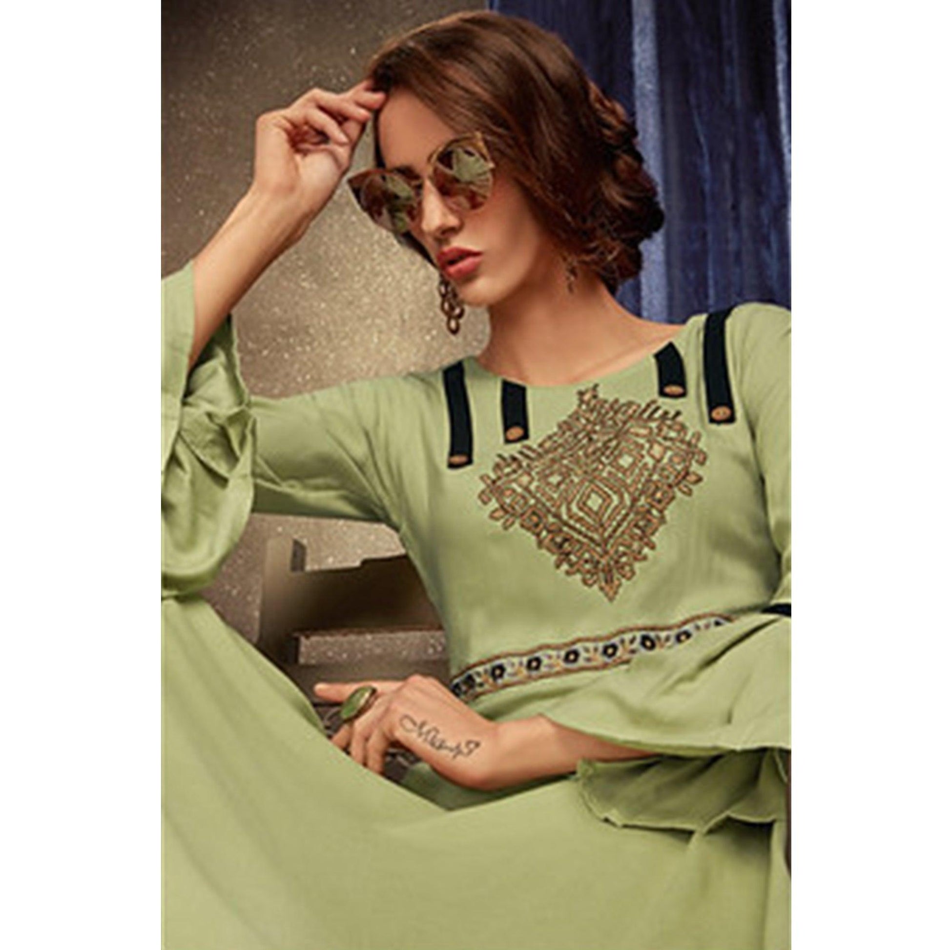 Breathtaking Pista Green Colored Partywear Embroidered Rayon Long Kurti