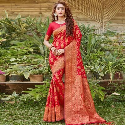 Breathtaking Red Colored Festive Wear Paisely Woven Silk Blend Saree With Tassels