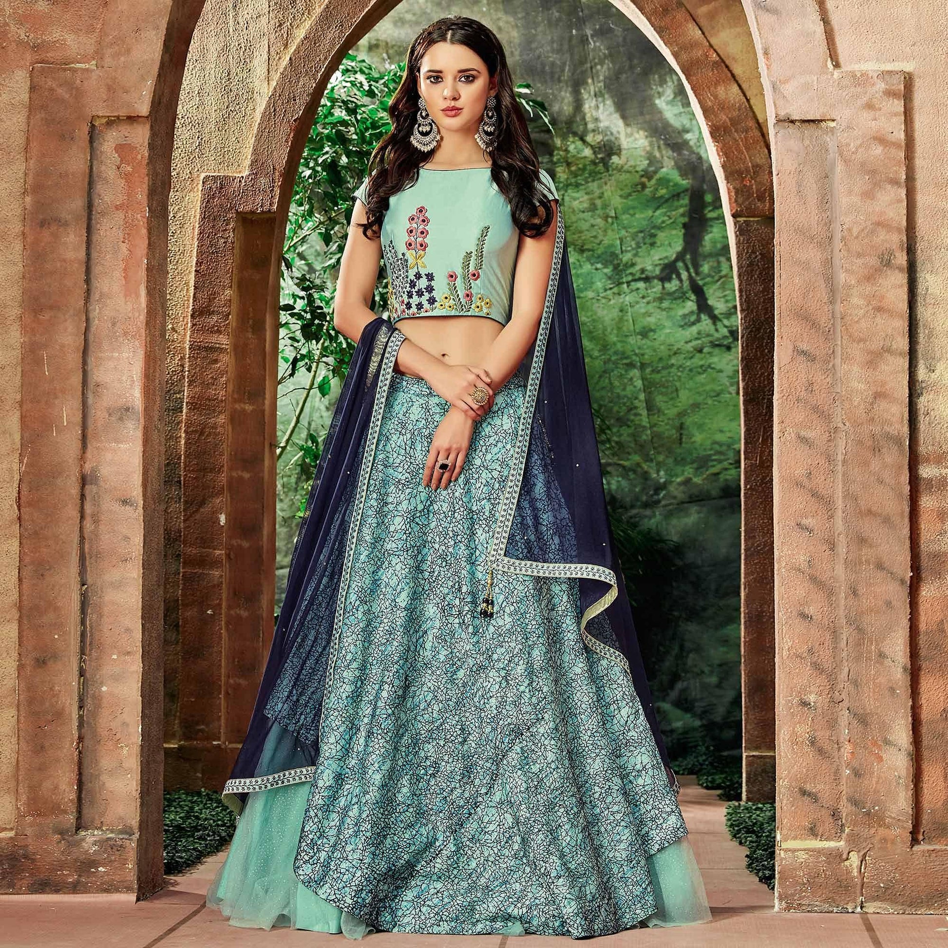 Breathtaking Sea Blue Colored Partywear Embroidered Silk-Net Lehenga Choli