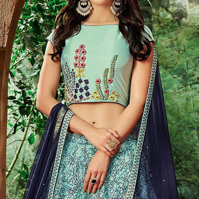 Breathtaking Sea Blue Colored Partywear Embroidered Silk-Net Lehenga Choli