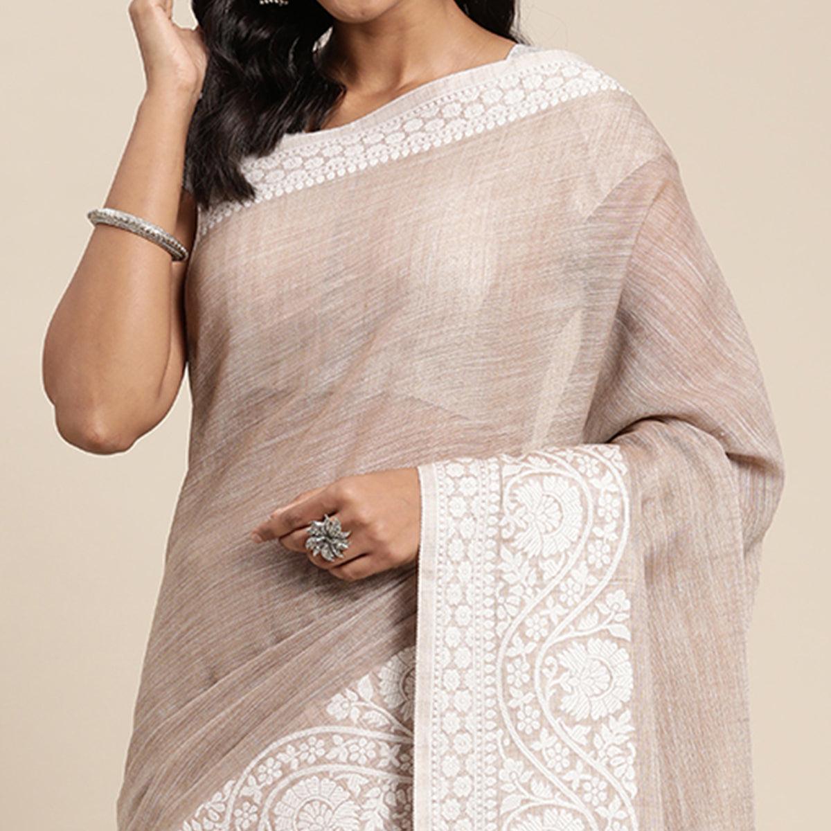 Brown Embroidered Linen Saree with Tassels