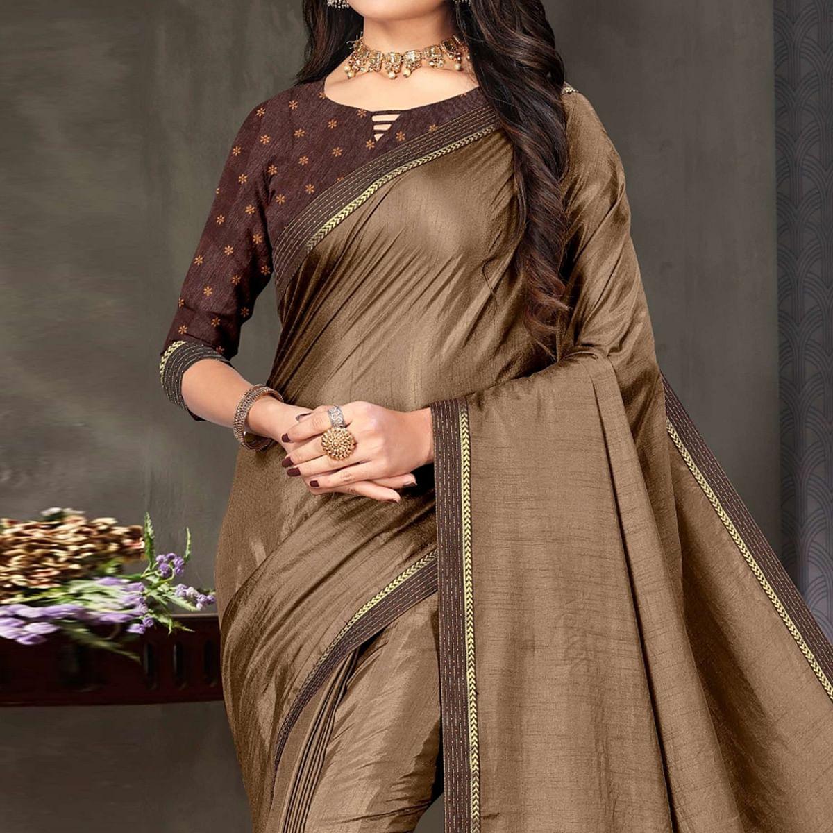 Brown Festive Wear Embellished Art Silk Saree