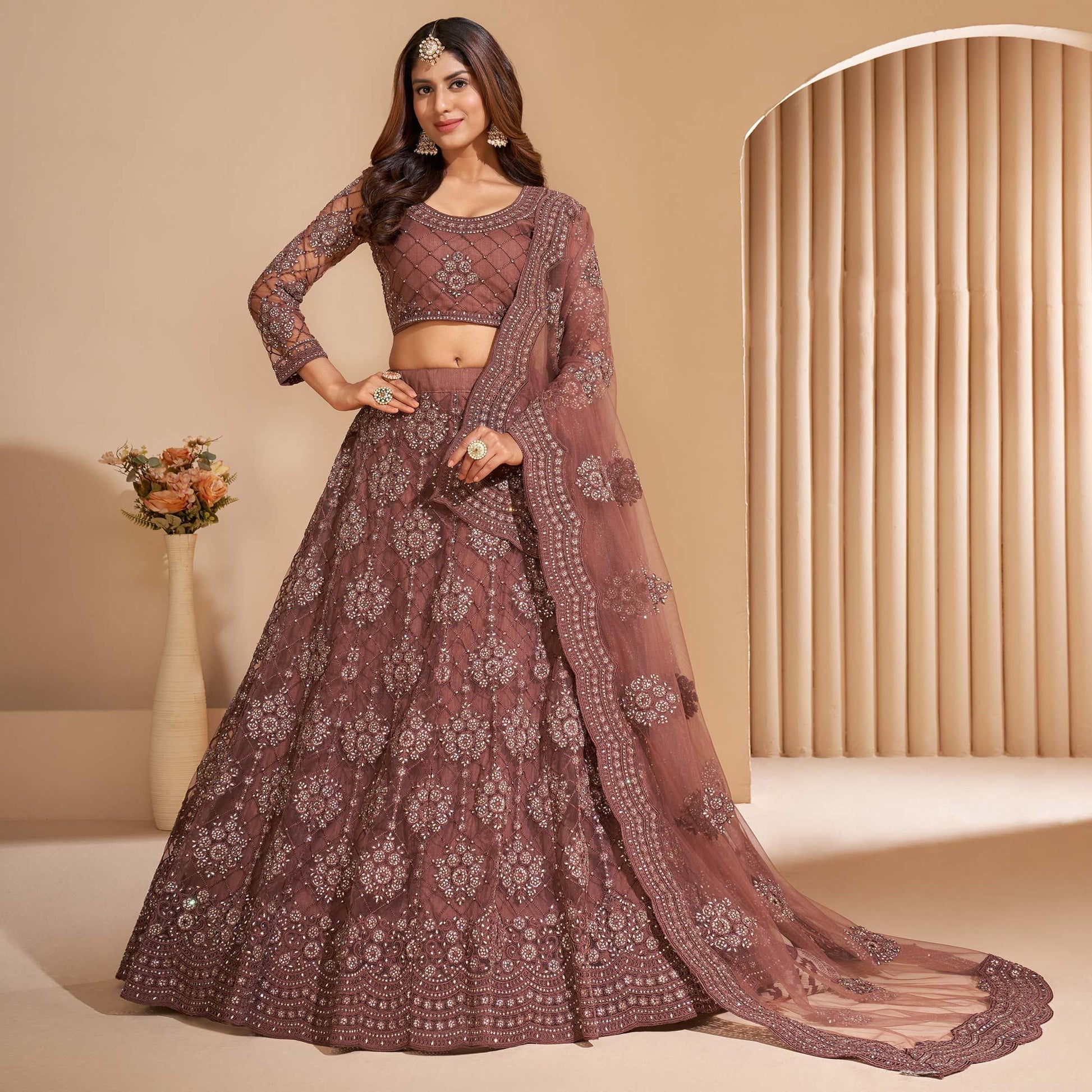 Brown Wedding Wear Embroidered With Embellished Net Lehenga Choli