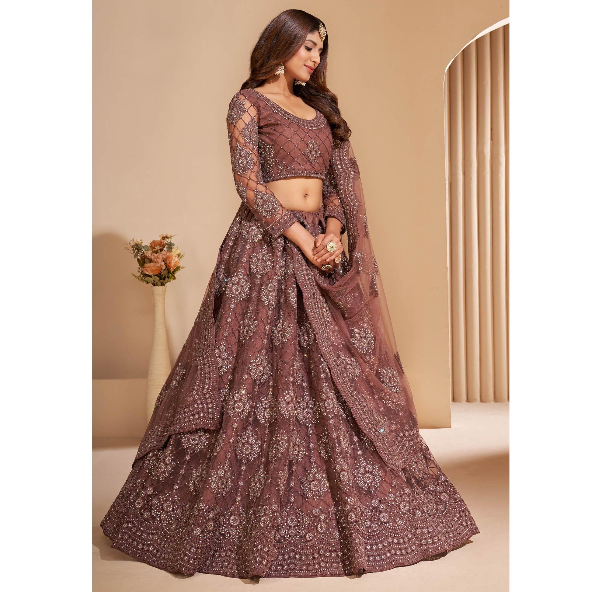 Brown Wedding Wear Embroidered With Embellished Net Lehenga Choli