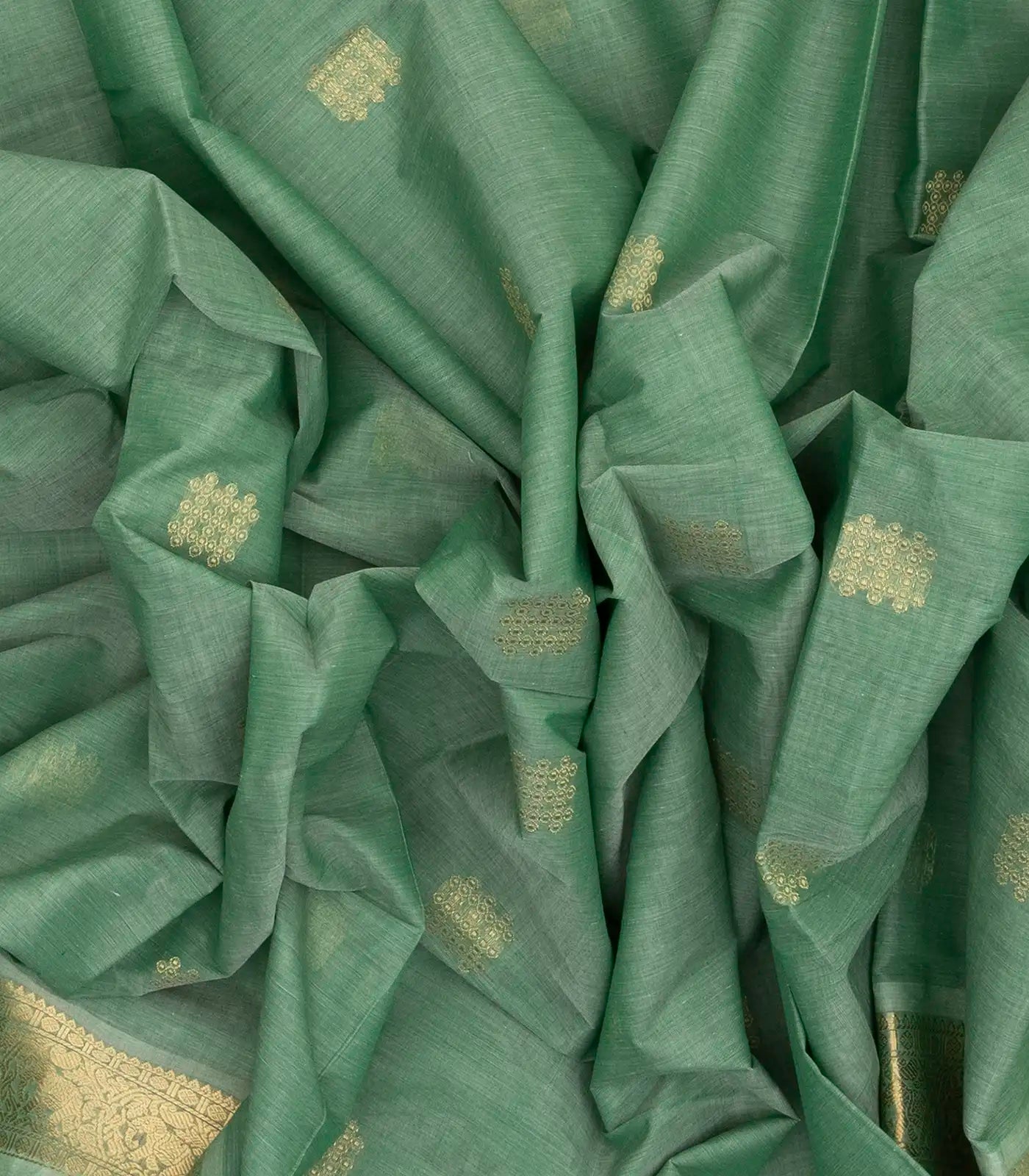 Light Green Handloom Kanchi Cotton Saree With Kolam Butta And Animal Motifs.