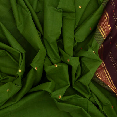 Green Handloom Kadapa cotton saree adorned with red Meenakari buttis