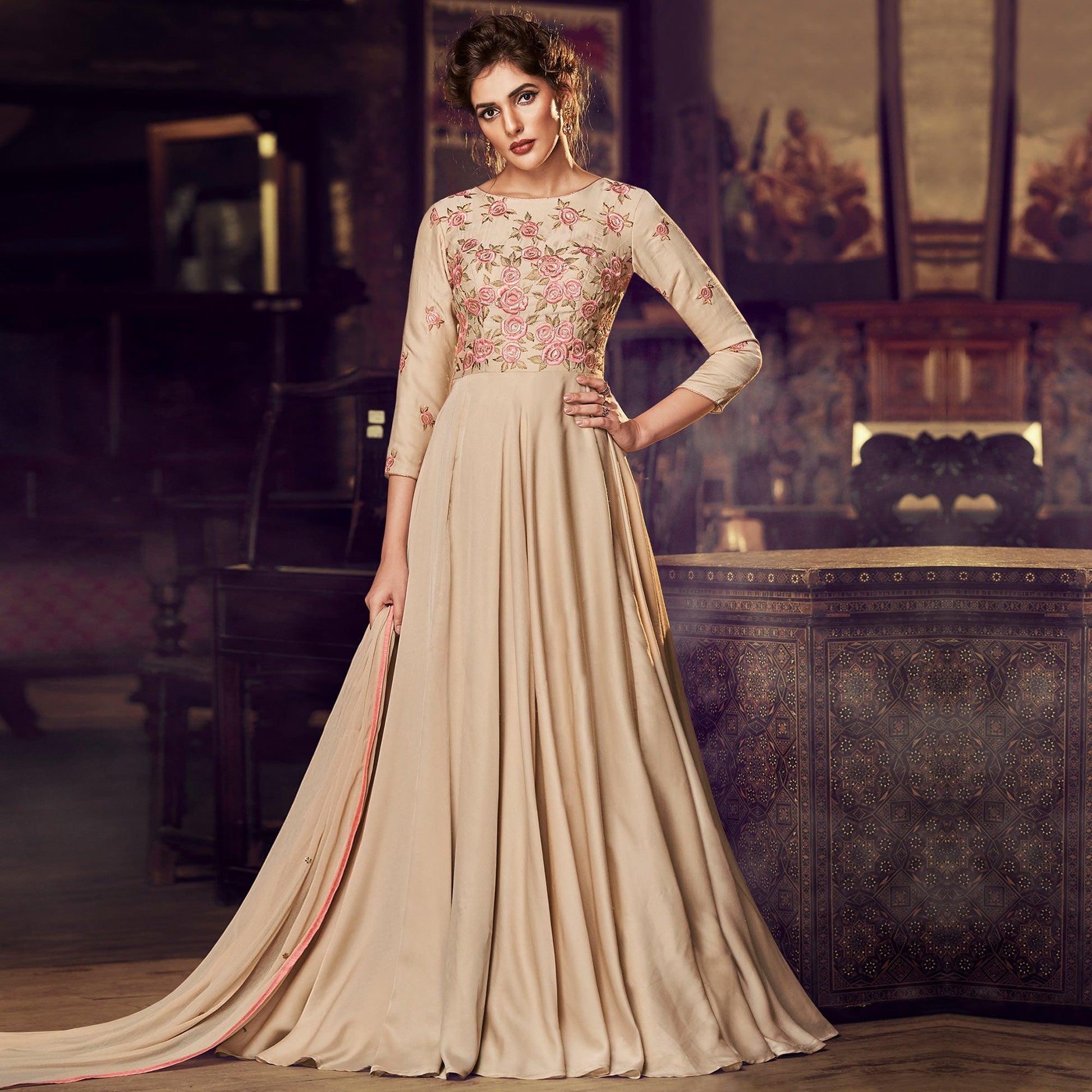Capricious Chiku Colored Partywear Embroidered Modal Satin Gown With Dupatta