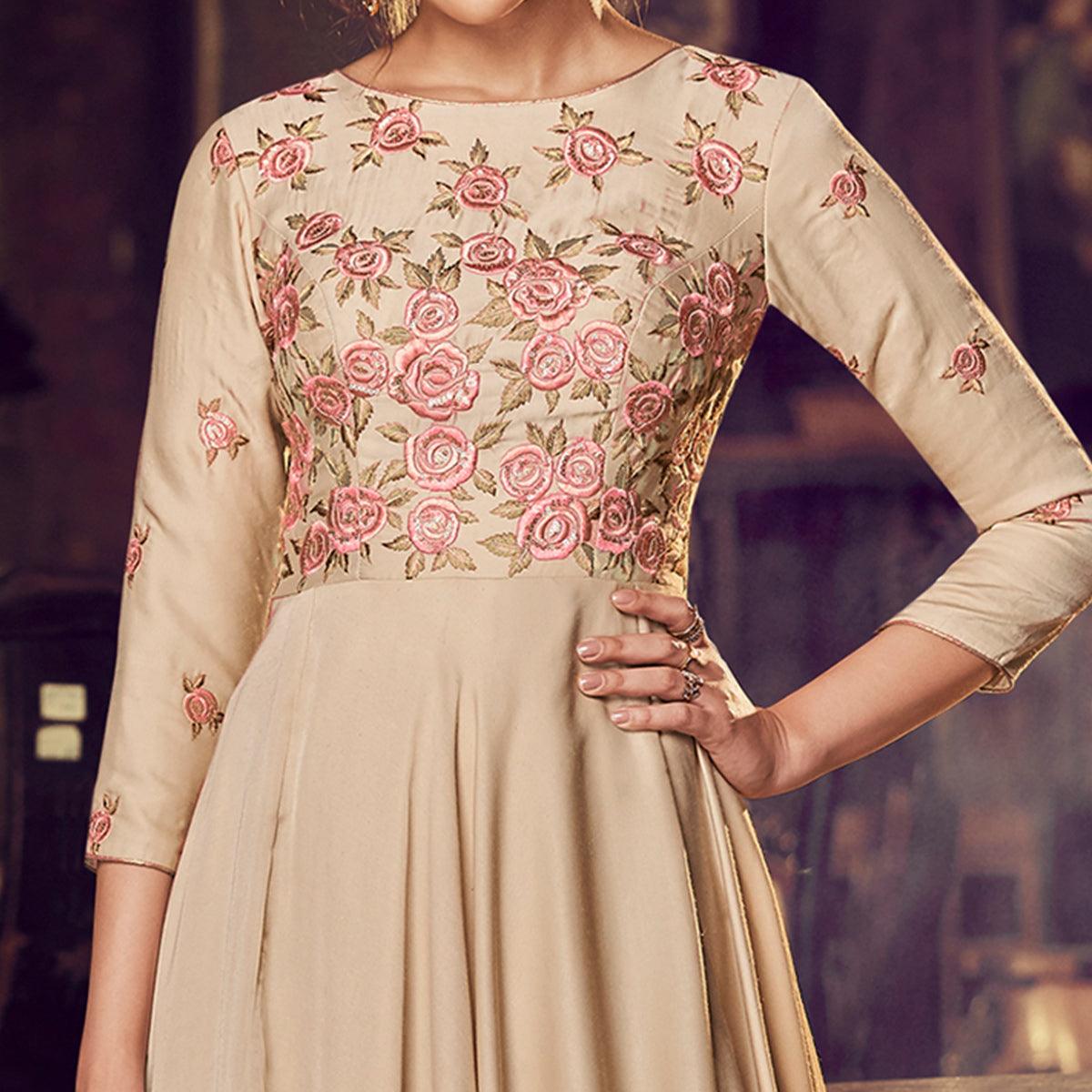 Capricious Chiku Colored Partywear Embroidered Modal Satin Gown With Dupatta