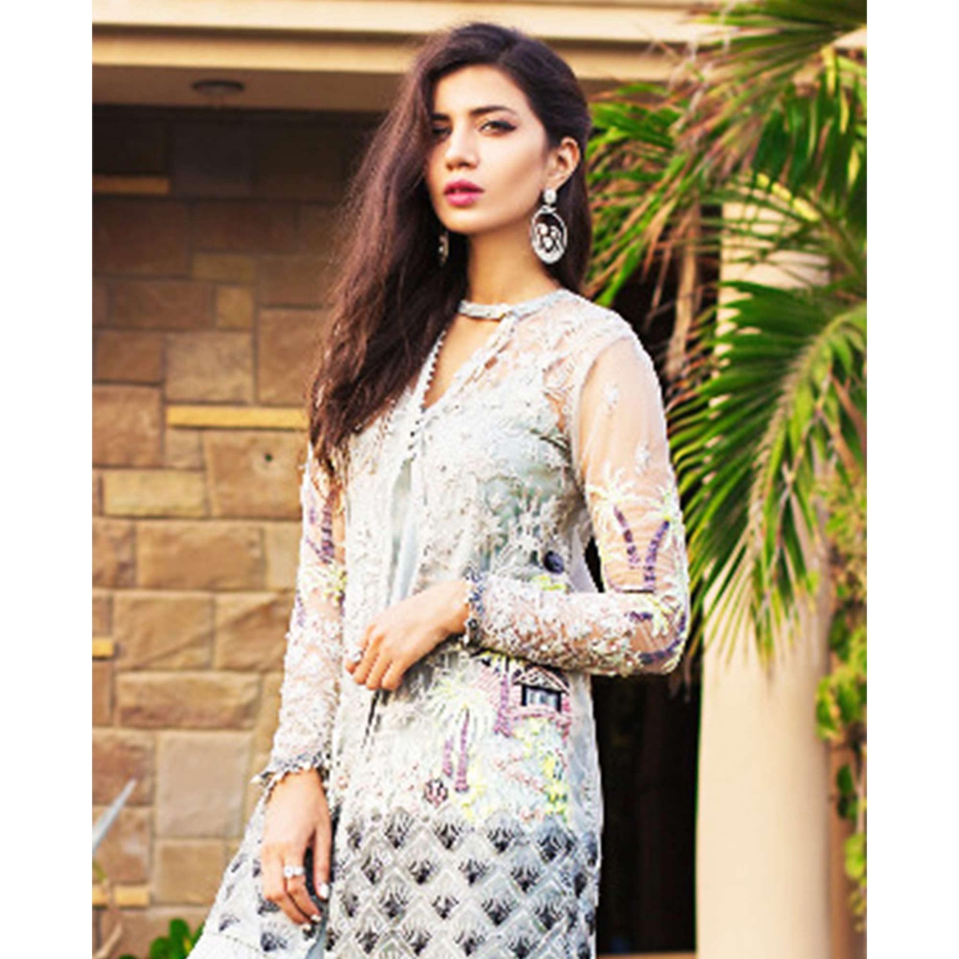 Capricious Light Blue Colored Partywear Embroidered Netted Palazzo Suit
