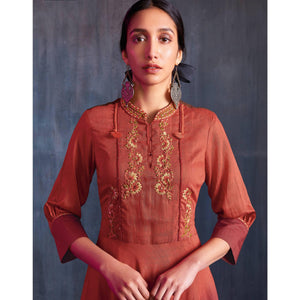 Capricious Maroon Colored Partywear Embroidered Viscose Gown