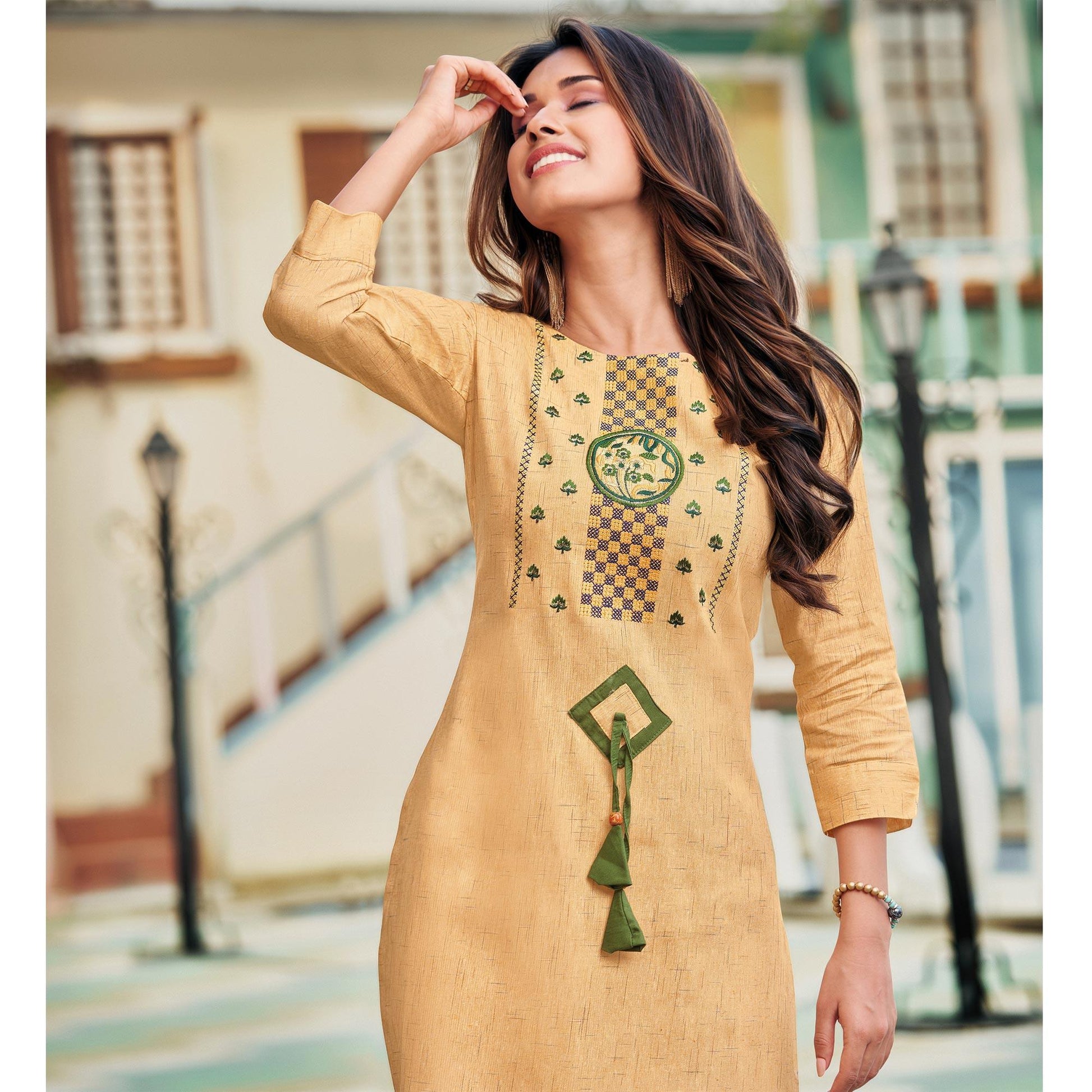 Capricious Yellowish Beige Colored Casual Wear Embroidered Heavy Pure Cotton Kurti