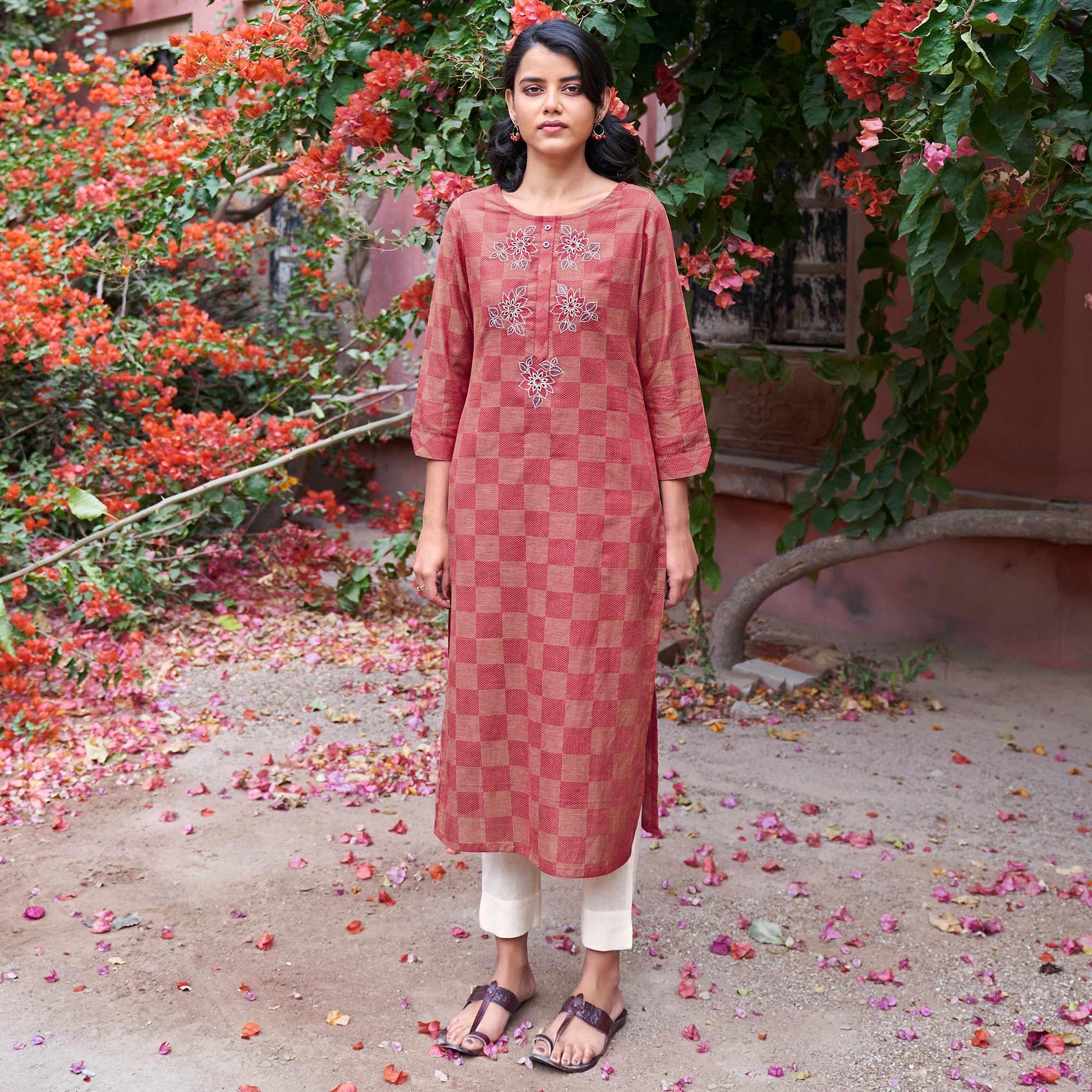 Captivating Dark Peach Colored Casual Wear Embroidered Pure Cotton Kurti