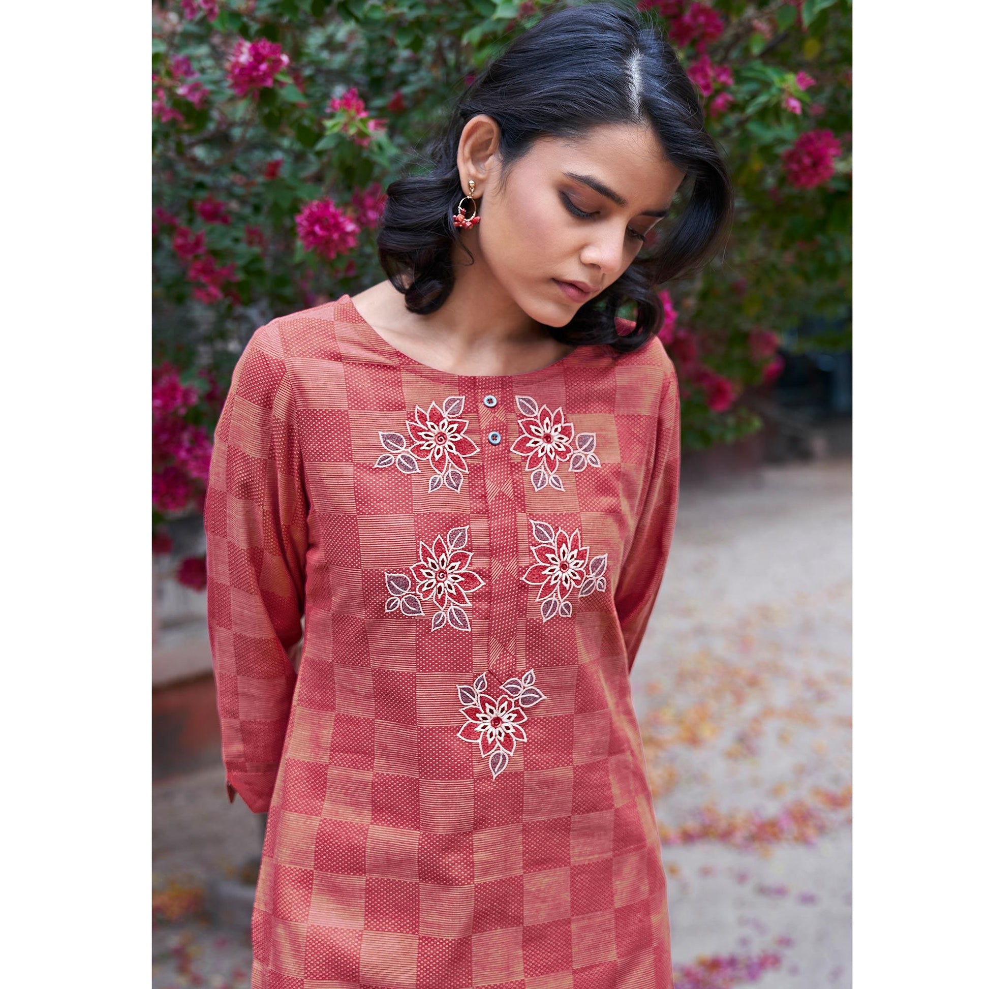 Captivating Dark Peach Colored Casual Wear Embroidered Pure Cotton Kurti