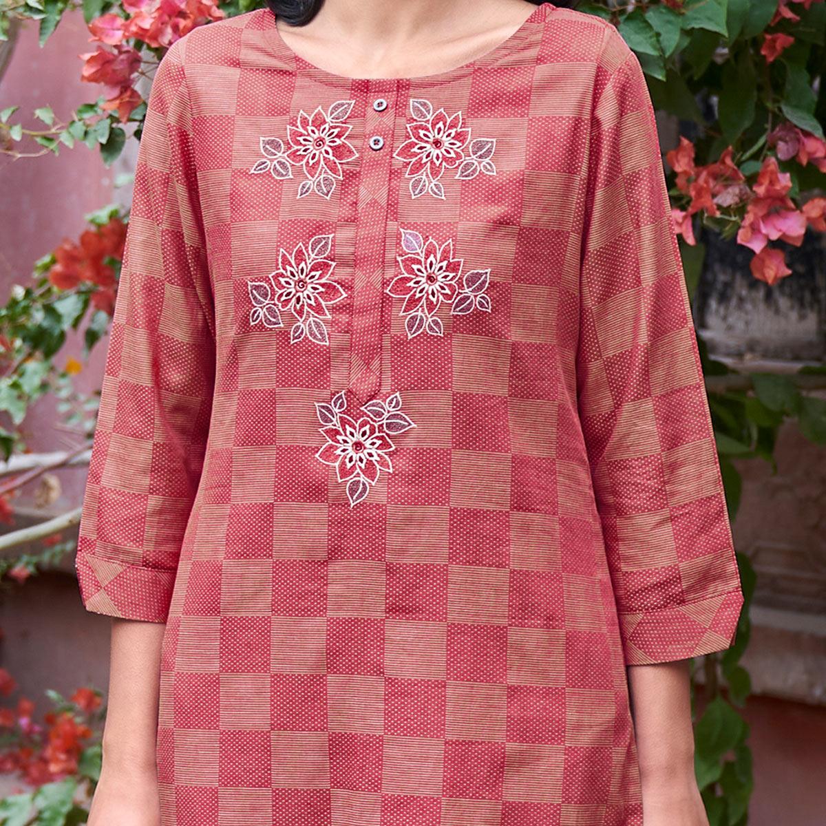 Captivating Dark Peach Colored Casual Wear Embroidered Pure Cotton Kurti