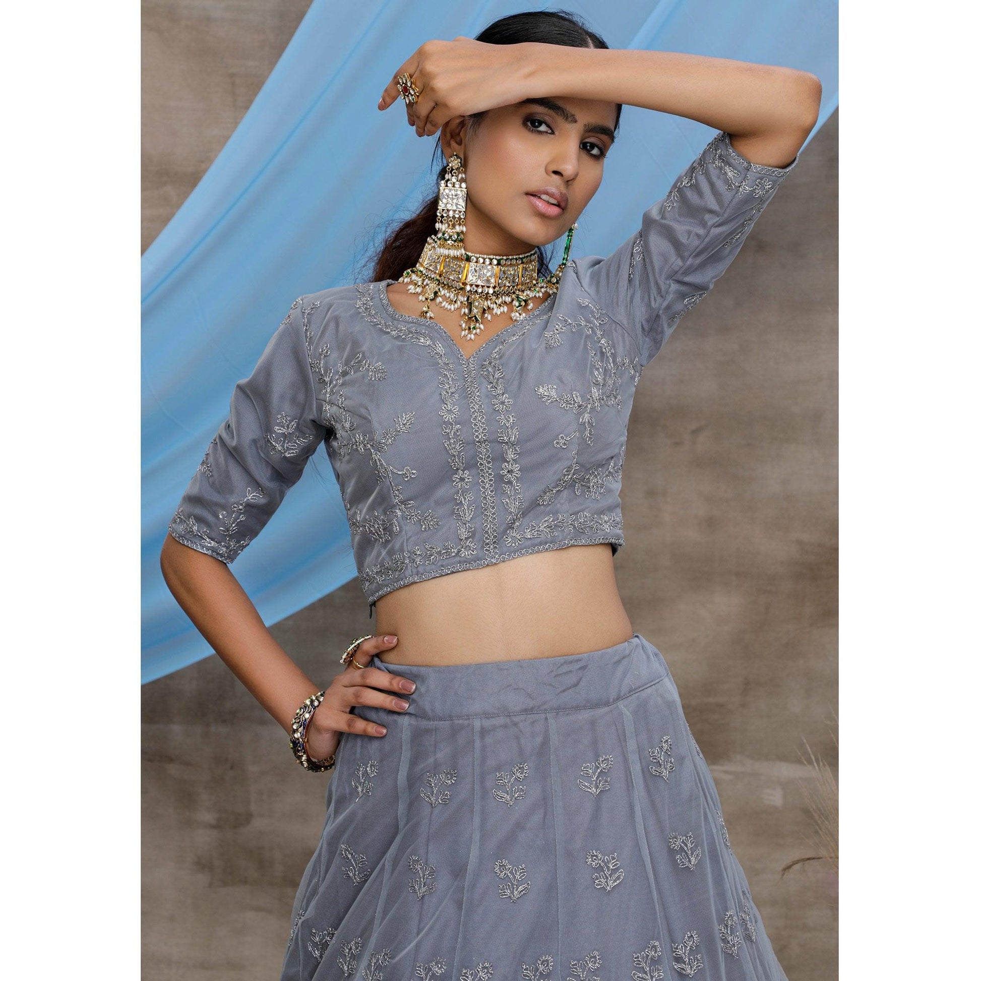 Captivating Grey Colored Party Wear Heavy Embroidered Net Lehenga Choli