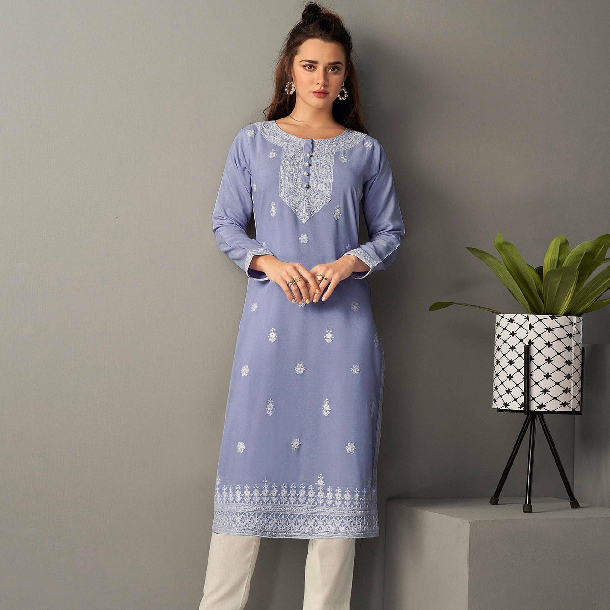 Captivating Lavendar Colored Casual Wear Embroidered Pure Rayon Viscose Kurti