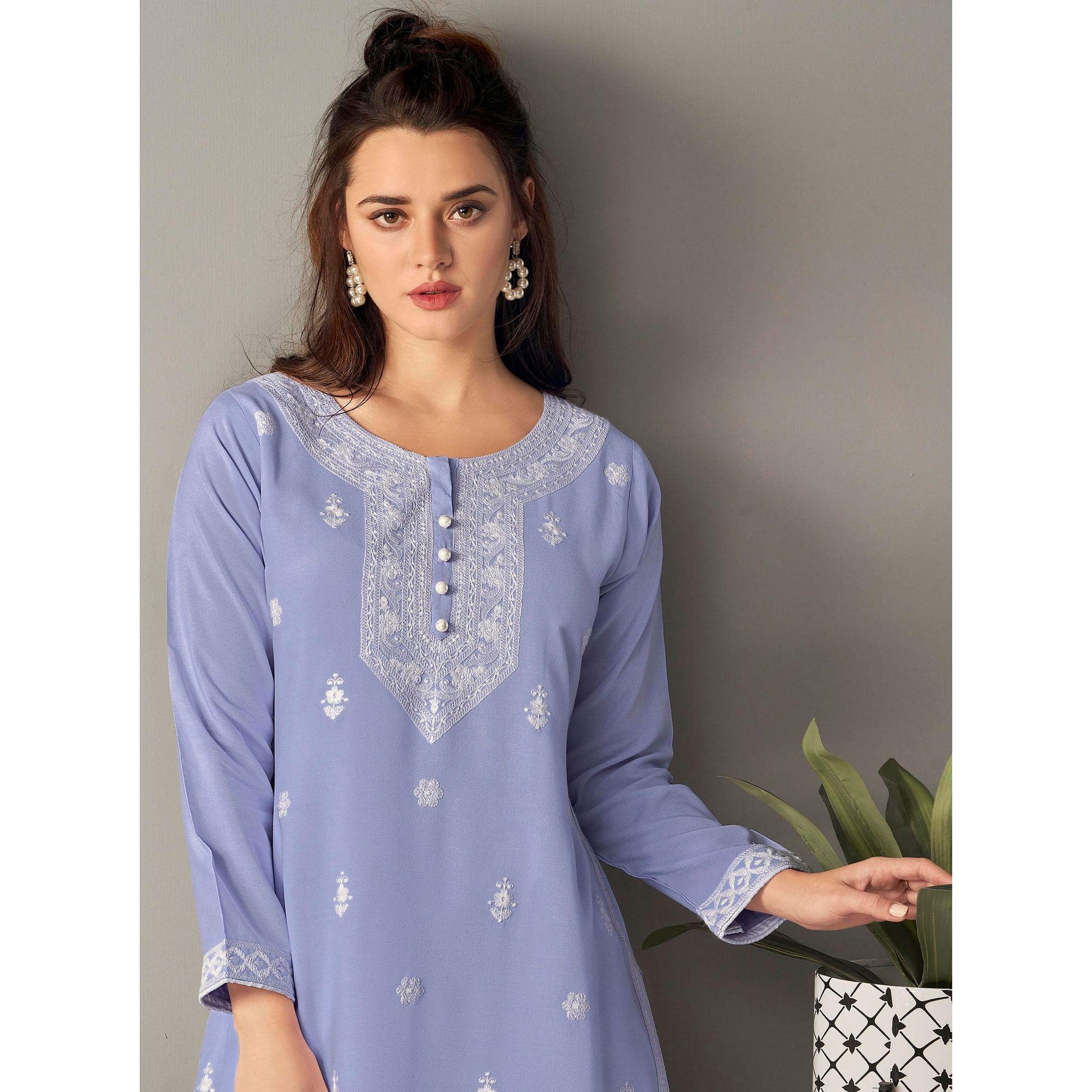 Captivating Lavendar Colored Casual Wear Embroidered Pure Rayon Viscose Kurti
