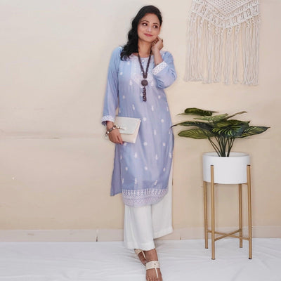 Captivating Lavendar Colored Casual Wear Embroidered Pure Rayon Viscose Kurti