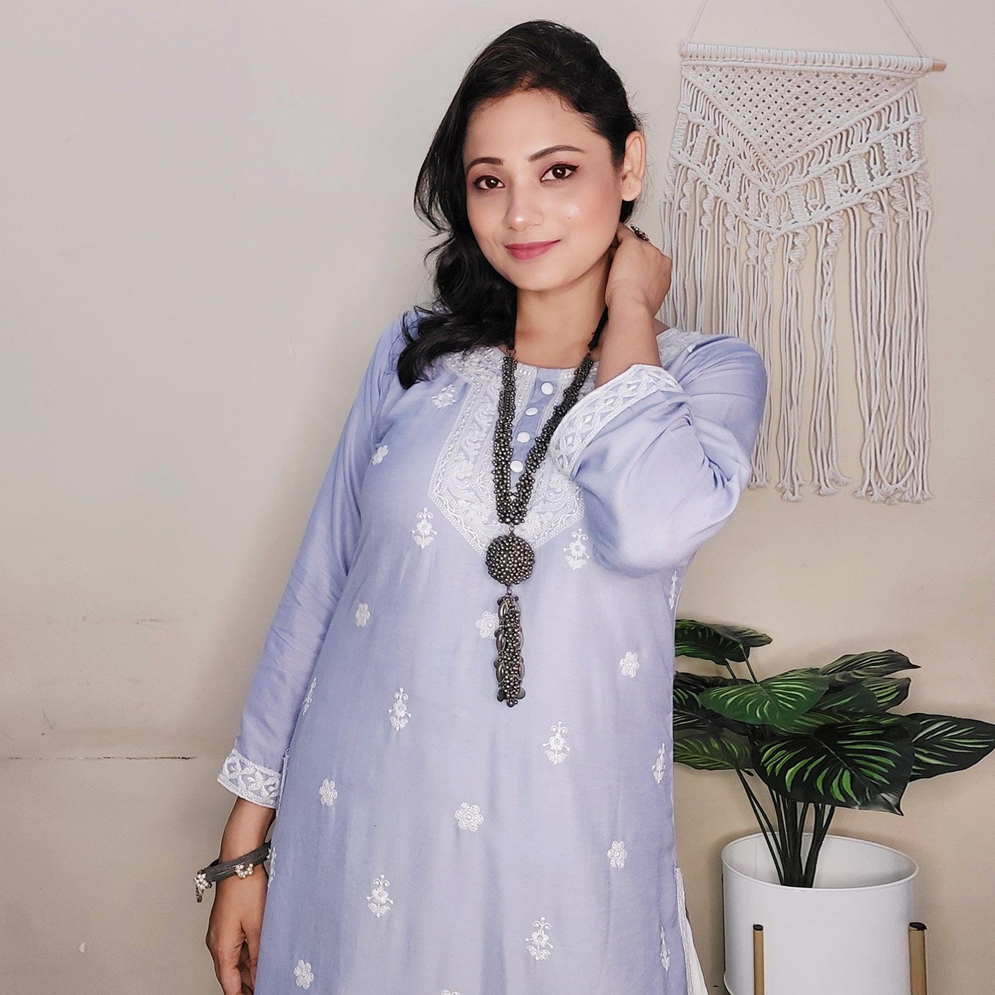Captivating Lavendar Colored Casual Wear Embroidered Pure Rayon Viscose Kurti