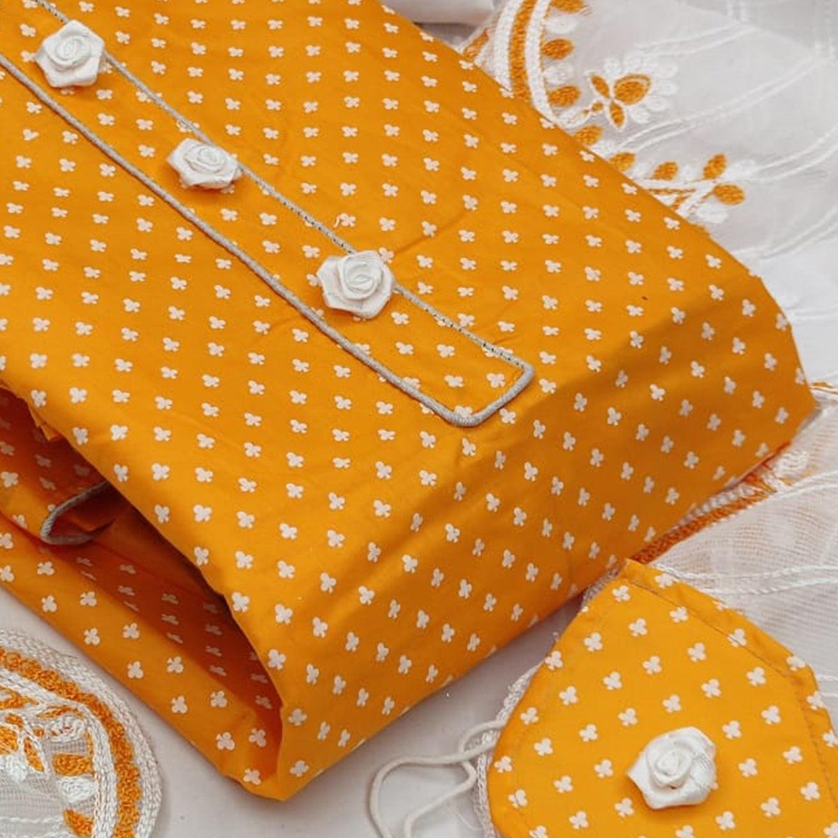 Captivating Mustard Yellow Colored Casual Wear Printed Cotton Dress Material