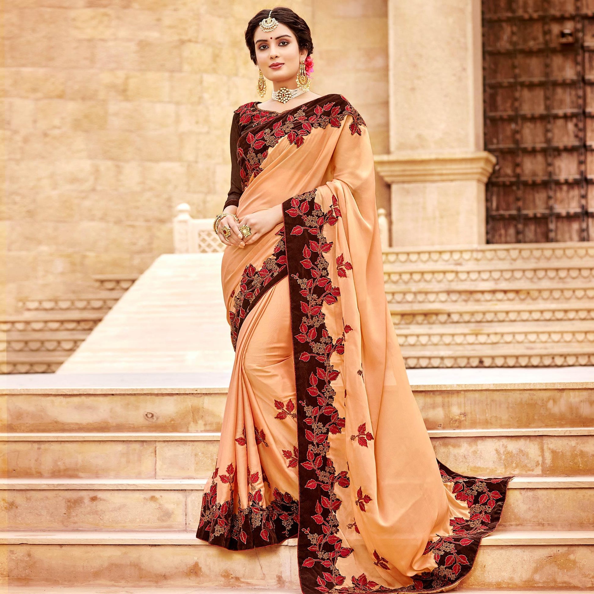 Captivating Peach Colored Party Wear Embroidered Satin-Georegtte Saree